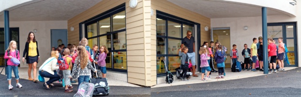 Petits et grands s'alignent pour l'entrée en classe.